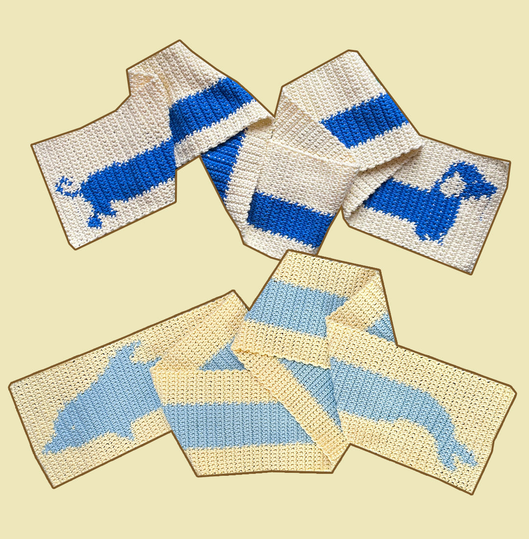 A stylish pink and white scarf from the "Crochet pattern combo pack ✧ Pet scarves" by devout hand, featuring a charming reindeer pattern on both ends, is displayed on a checkered green and white rug.